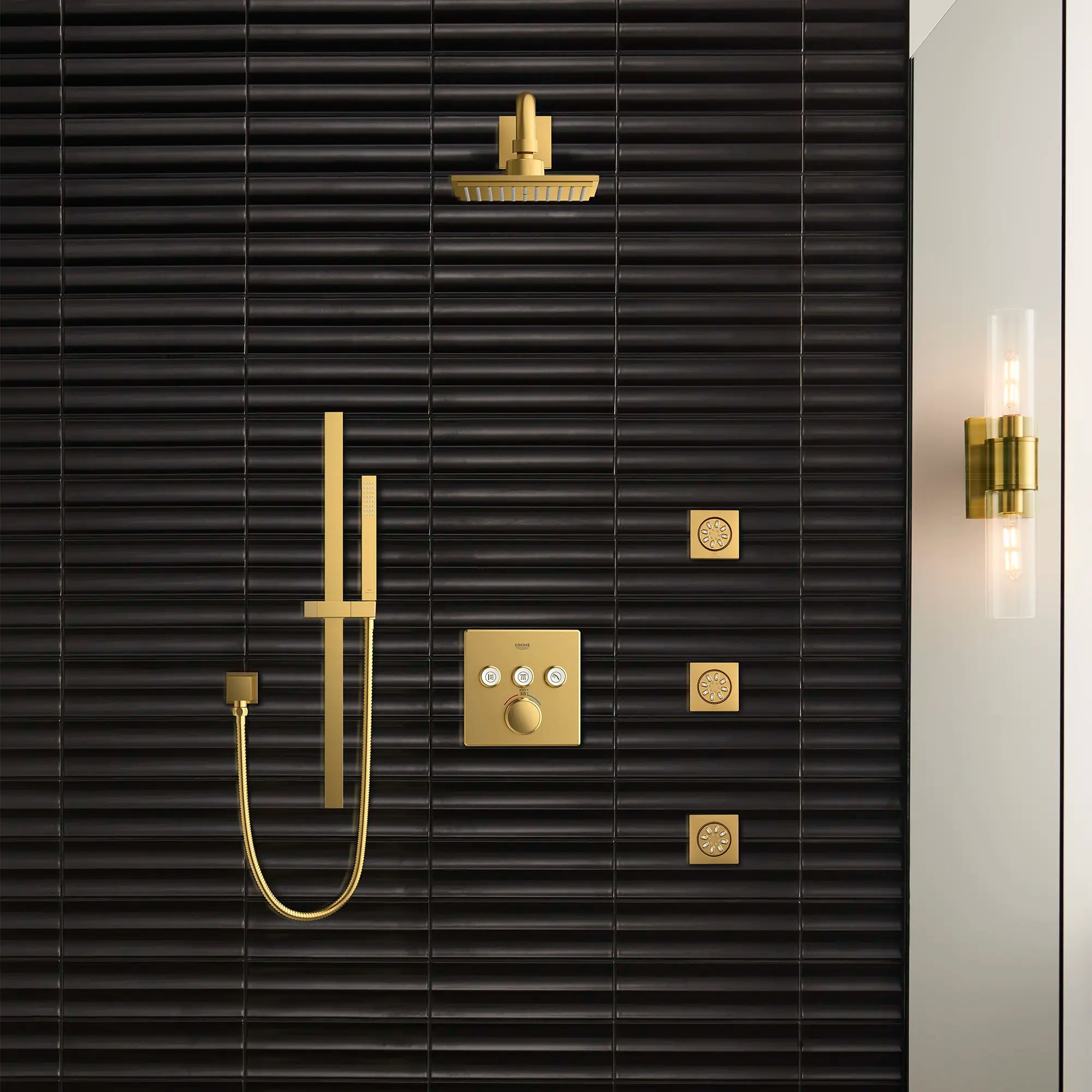 Grohtherm Triple Function Thermostatic Valve Trim // Brushed Cool Sunrise (Brushed Gold) // 186499_EuphoriaCube_EnvironmentCloseUp_26468GN0_26845GN0_27892GN0_29142GN0_0001_Sept2023_CDNwebp.webp